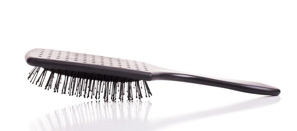 Black hairbrush isolated — Stock Photo, Image