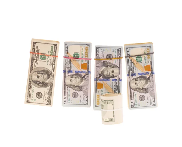 Contas de dólar em pilhas e rolo — Fotografia de Stock