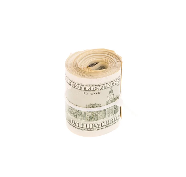 Billets en dollars dans un rouleau isolé — Photo