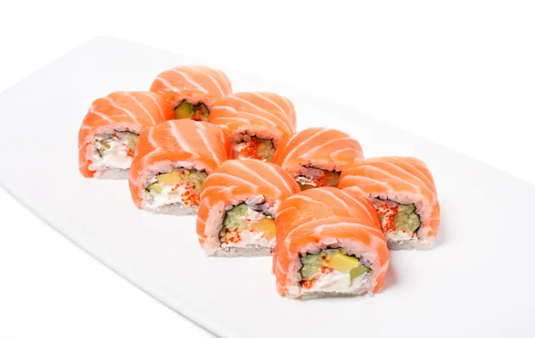 Rotoli di salmone Uramaki con avocado . — Foto Stock