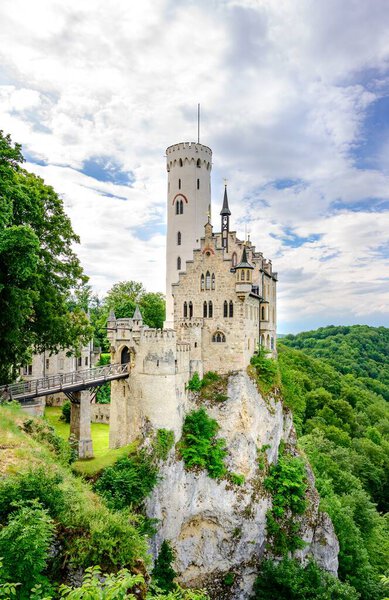 Romantic Castle Schloss Lichtenstein with a bridge on the top of mountain. Baden-Wurttemberg, Germany