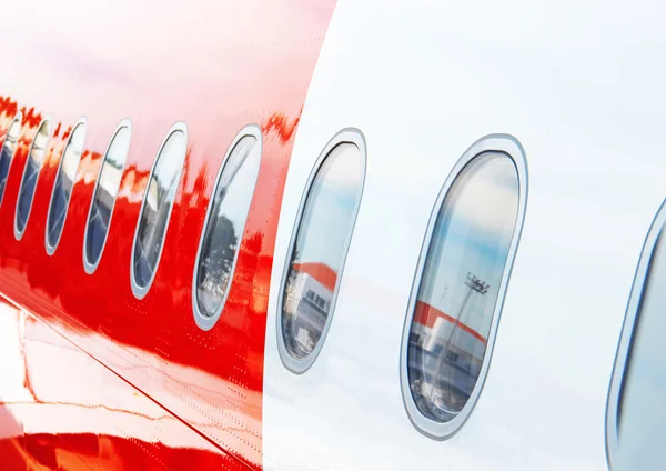 Windows airplane on blue sky background — Stock Photo, Image