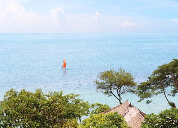 Red boat and blue water ocean — Stock Photo, Image