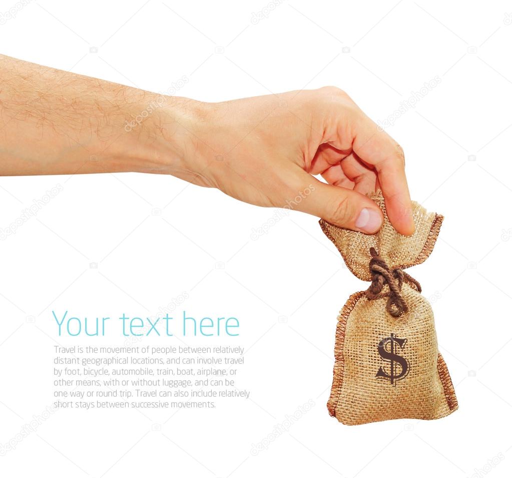 Man's hand gives the bag with dollars