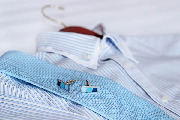 Men's classic shirts on the bed. Shallow depth of field — Stock Photo, Image