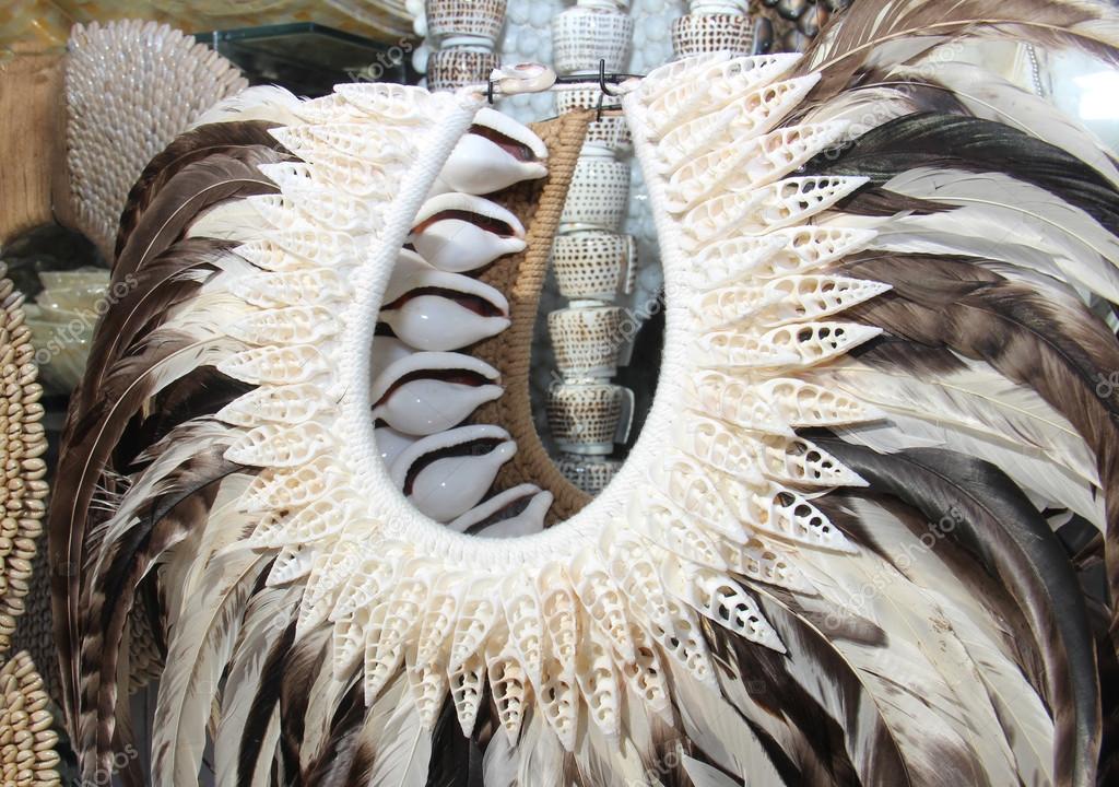 Costume made of shells and feathers