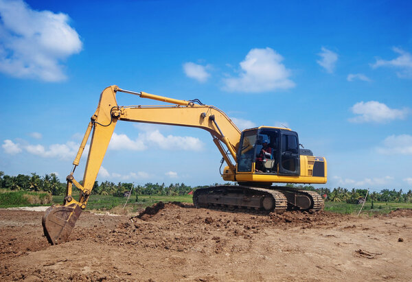 Excavator working at construction site