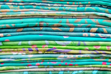 pile of colorful fabric . clipart