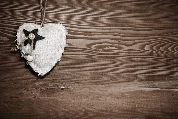 Love heart on wooden texture background — Stock Photo, Image