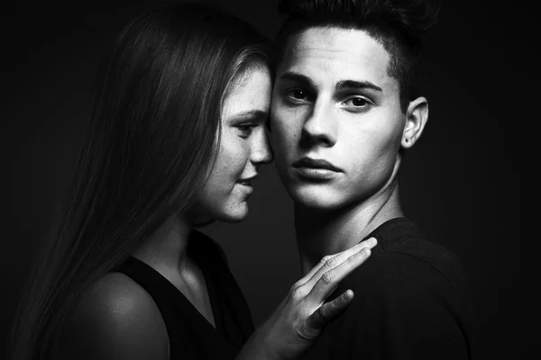 Fashion portrait of young beautiful couple — Stock Photo, Image