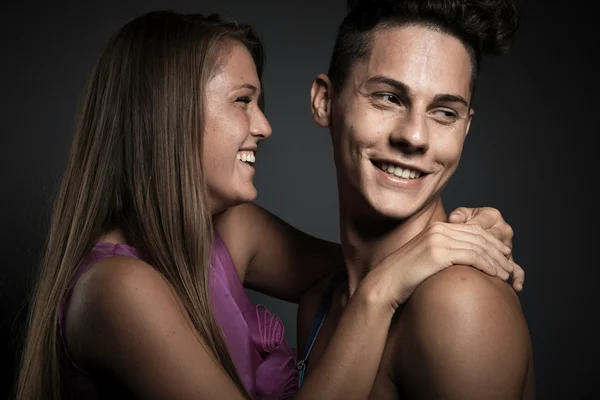 Fashion portrait of young beautiful couple — Stock Photo, Image