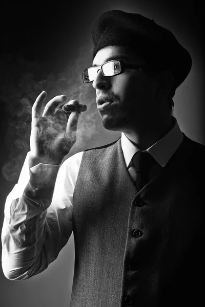 Hipster young man smoking cigar — Stock Photo, Image