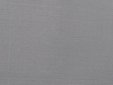 Oturma odasındaki beton renginde boyanmış duvar dokusu