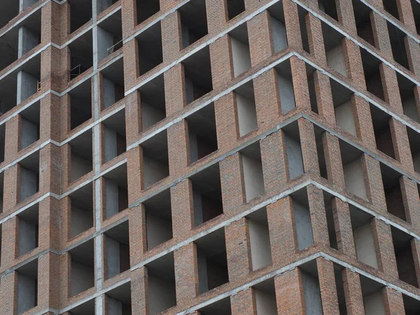 Ziegelverlegung Einem Mehrstöckigen Gebäude Mit Kleinem Rahmen — Stockfoto