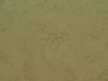 Duvarın dokusu soyut dekoratif alçıyla süslenmiş.