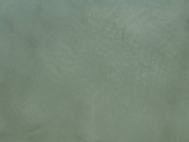 Duvarın dokusu soyut dekoratif alçıyla süslenmiş.