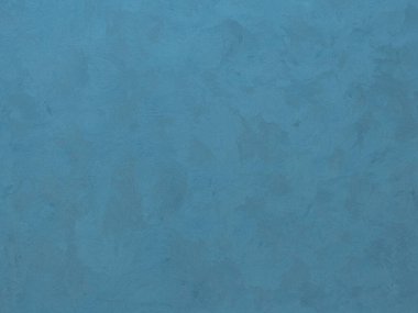 Duvarın dokusu soyut dekoratif alçıyla süslenmiş.