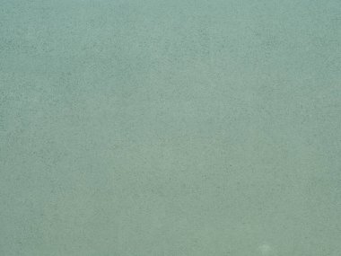 Duvarın dokusu soyut dekoratif alçıyla süslenmiş.