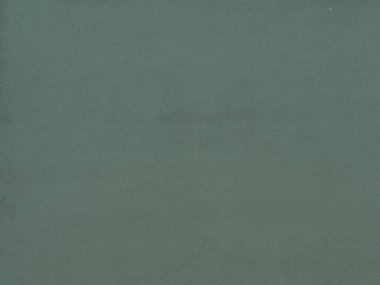 Duvarın dokusu soyut dekoratif alçıyla süslenmiş.