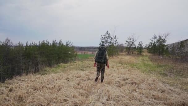 Young Man Backpack Walking Forest Daytime Slow Motion — Stock Video