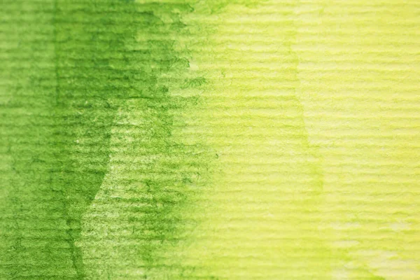 Gelber und grüner Aquarell-Hintergrund auf strukturiertem Papier — Stockfoto