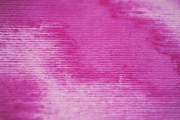 Fundo aquarela rosa sobre papel texturizado — Fotografia de Stock