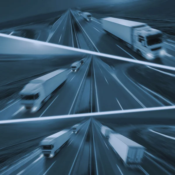 Fast delivery trucks in motion blur on highway — Stock Photo, Image