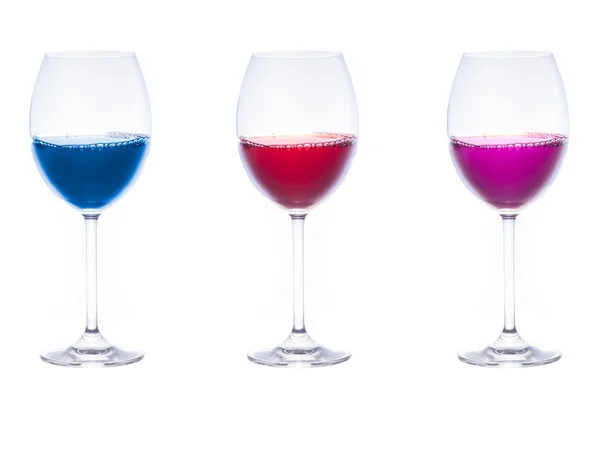 Tres vasos con líquidos coloridos en el interior — Foto de Stock