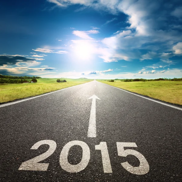 Driving on an empty road to new 2015 — Stock Photo, Image