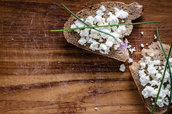 Rustic bread with cottage cheese — Stock Photo, Image