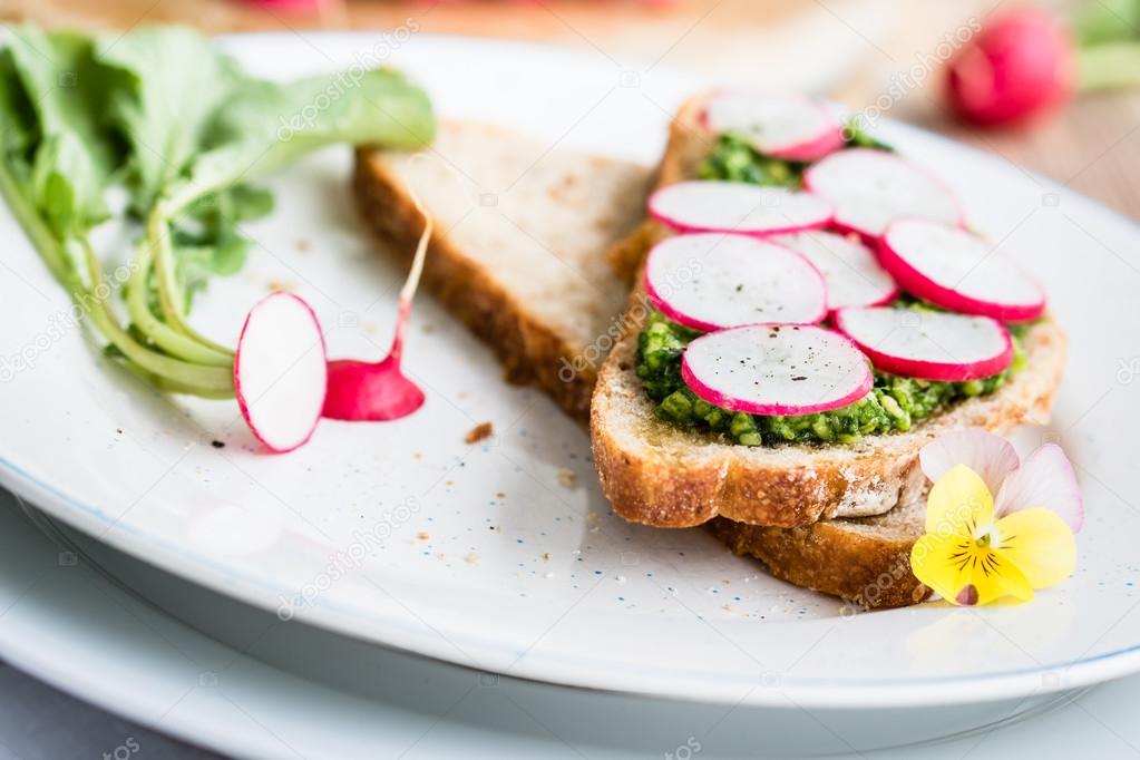 Vegan sandwich with radish rings