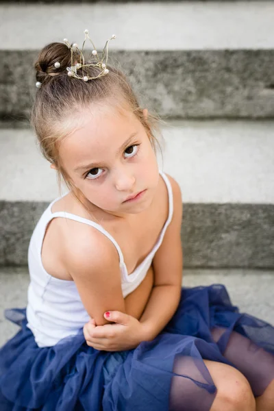 Sad little princess with golden crown — Stock Photo, Image