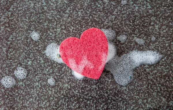 Sponge in a heart shape — Stock Photo, Image
