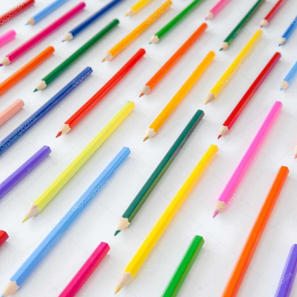 Colorful crayons in parallel lines