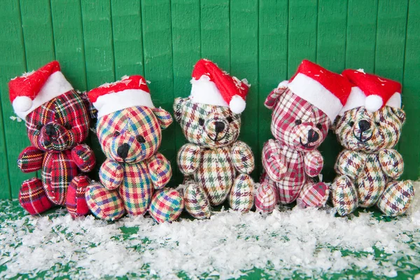 Little teddybears with Santa hats — Stock Photo, Image