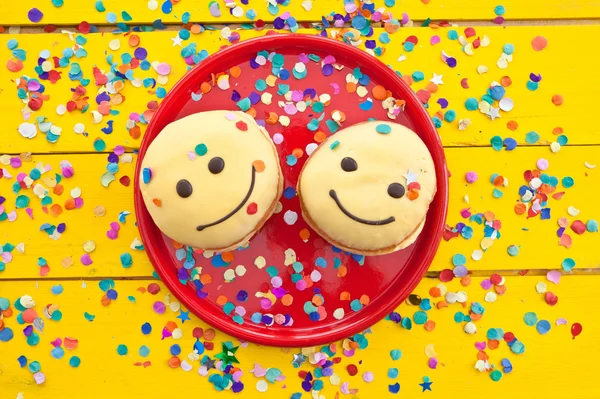 Donut with funny smiley face — Stock Photo, Image