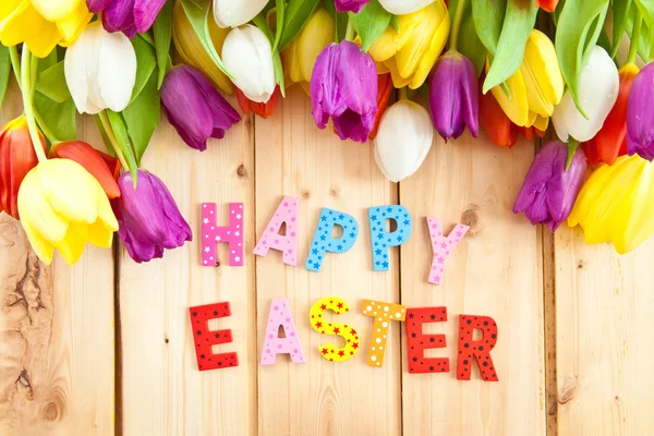 Happy Easter written in multicolored letters — Stock Photo, Image