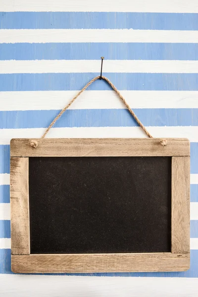 Rustic chalkboard on stripes — Stock Photo, Image