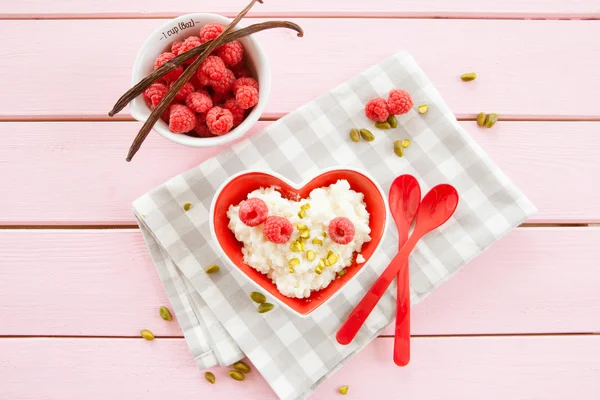 Rice pudding with raspberries — Stock Photo, Image