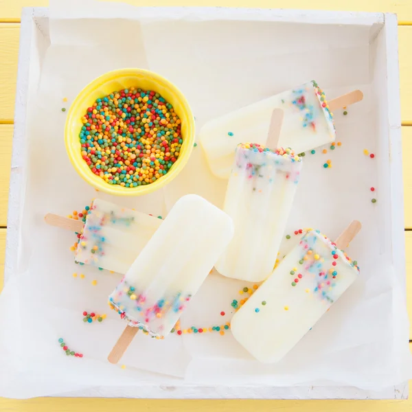 Frozen popsicles with sprinkles — Stock Photo, Image