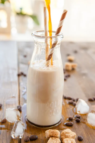 Iced coffee in vintage bottle — Stock Photo, Image