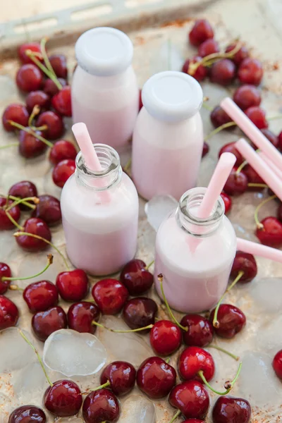 Creamy milk shake with cherries — Stock Photo, Image