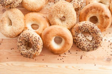 Variety of fresh bagels clipart