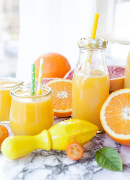 Juice made from fresh citrus fruits — Stock Photo, Image