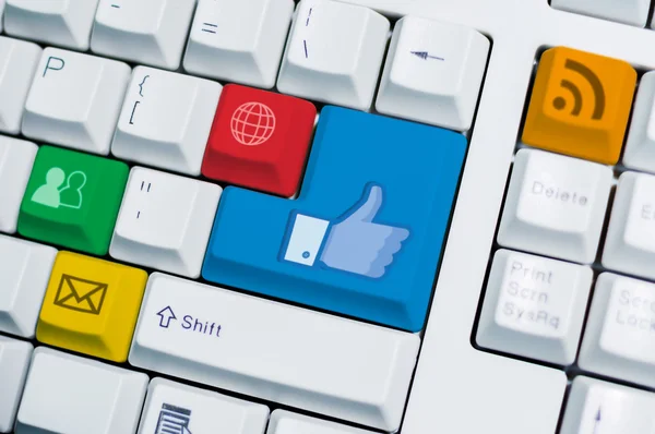 Social media computer keyboard with many universal application sign — Stock Photo, Image