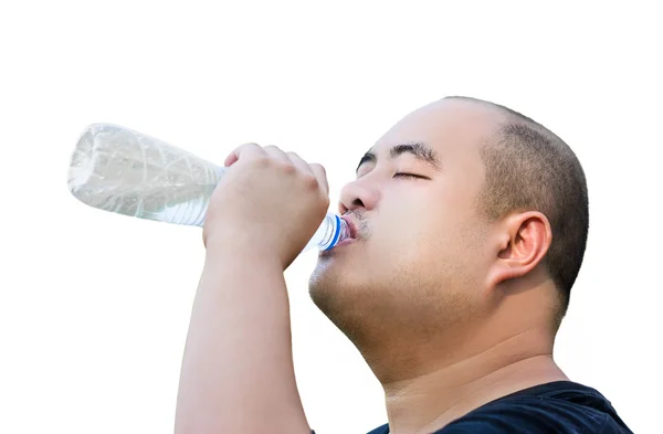 An Asian bald head guy is drinking water with thirst in isolated background — Stock Photo, Image