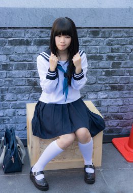 Bangkok, Tayland - 31 Mart: Sevimli Tay cosplayer Japon kız öğrenci pozlar 3 Tay-Japonya anime Festivali yılında fotoğraf için olarak 31 Mart 2013 Bangkok'ta Giydir.