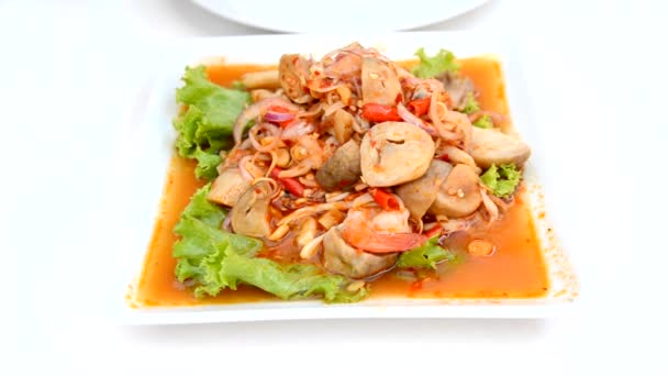 Spicy mingle mushroom salad gourmet. A person is eating spicy Thai cuisine food with fork as main dish. — Stock Video