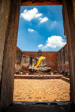 Wat Worachettharam Tapınağı, Phra Nakhon Si Ayutthaya 'da oturan Buda, Tayland' ın tarihi şehri.