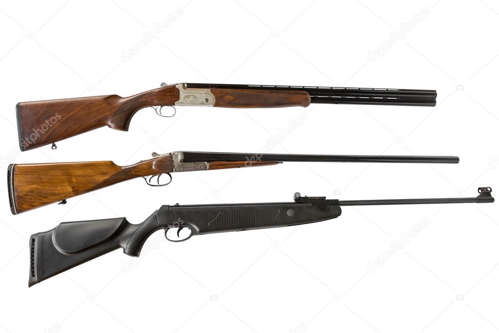 double-barreled shotguns and air gun isolated on white background